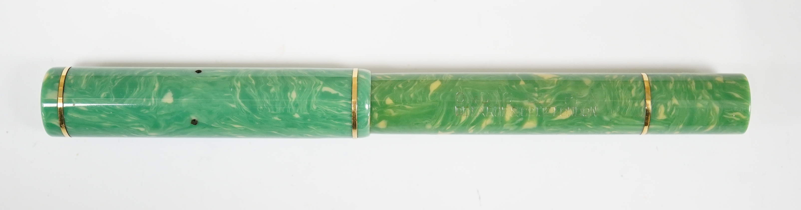 A De La Rue Onoto lever filler in green with rolled gold bands